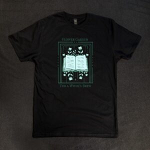 black t shirt with spell book